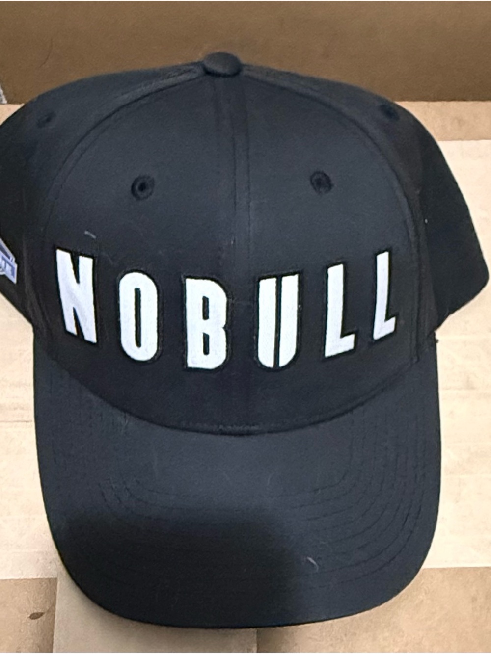 NOBULL Black Snapback Cap with White Interior Logo